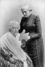 Elizabeth Cady Stanton (1815-1902), Seated, and Susan B. Anthony (1820-1906), Standing, three-quarter length Portrait, 1900