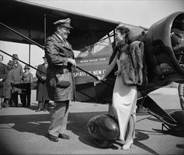 Aviator Roscoe Turner Presenting Red High Wing Monoplane to the Friends of New China, Represented by Hilda Yen, Chinese Aviatrix, Washington Airport, Washington DC, USA, Harris & Ewing, April 3, 1939