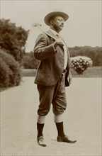 U.S. President Theodore Roosevelt, Full-Length Portrait Wearing Knickerbockers and Carrying Ax on Shoulder, by James Burton, September 23, 1901