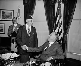 U.S. President Franklin Roosevelt Greeting Leonard P. Stewart of Almas Temple, Oval Office, White House, Washington DC, USA, Harris & Ewing, 1935