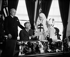 U.S. President Franklin Roosevelt Receiving Christmas Seals Presented by National Tuberculosis Association, Oval Office, White House, Washington DC, USA, Harris & Ewing, December 18, 1936