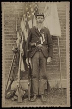 Unidentified Civil War Veteran from Grand Army of the Republic, Portrait in Uniform with Musket, 1880's