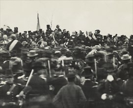 U.S. President Abraham Lincoln (without Hat below Flag slightly right) Standing Amongst Crowd during Dedication of Soldier's National Cemetery where he Delivered his Famous Speech, the Gettysburg Addr...