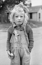 Young Girl Holding Fruit, Three-Quarter Length Portrait, Sisseton, South Dakota, USA, John Vachon, Farm Security Administration, September 1939
