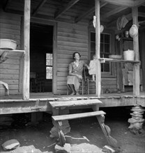 Young Child and Wife of Sharecropper on Rural Porch, Chesnee, South Carolina, USA, Dorothea Lange, Farm Security Administration, June 1937