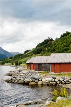 Boathouses on Fjord, Lysefjord, Norway