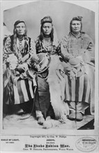 Three Native American Men, Eagle of Light, Joseph & Smohollah, Seated Portrait, The Idaho Indian War, by Charles W. Phillips, Walla Walla, Washington, USA, 1877