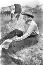 Dude Girl "Rassling" a Calf, Quarter Circle U Ranch Roundup, Montana, USA, Arthur Rothstein, Farm Security Administration, June 1939