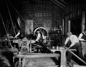 Student using Machinery in Woodworking Shop, Claflin University, Orangeburg, South Carolina, USA, W.E.B. DuBois Collection, 1899