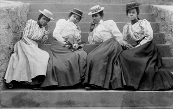 Four African American Women Sitting on Steps of Atlanta University, Atlanta, Georgia, USA, Thomas E. Askew, W.E.B. DuBois collection, 1900