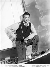Actor Larry Parkes, Publicity Portrait on Sailboat for the Film, "Renegades", Columbia Pictures, 1946