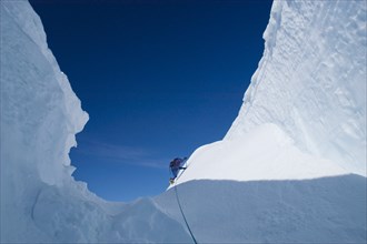 Ice Climber Exploring Glacier