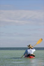 Man Kayaking on Ocean, Rear View, Florida Keys, USA