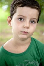 Young Boy With Pursed Lips, Portrait
