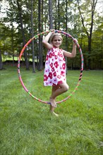 Young Girl Posing With Hula Hoop