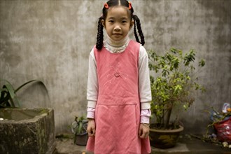 Young Vietnamese Girl in Pink Dress, Portrait
