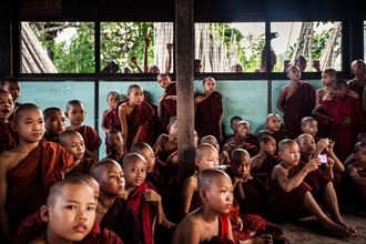 Crowd of Young Novice Monks in Small Room, Mandalay, Myanmar
