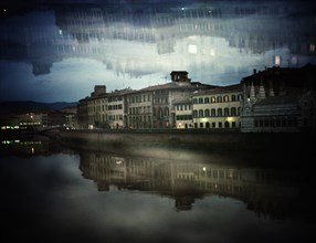 Reflections of Buildings in River, Pisa, Italy