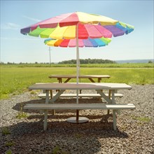 Picnic Tables With Colorful Umbrellas