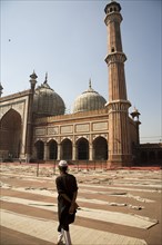 Man Walking by Jama Masjid, New Delhi, India
