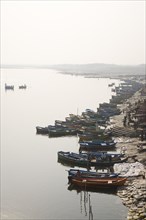 Boats Tied Up Along Bank of Ganges River