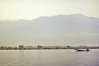 Fisherman in Boat on Inlay Lake at Dawn, Myanmar