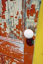 Old Orange Door With Peeling Paint