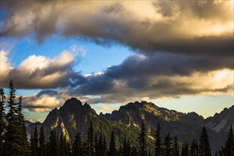 Mountains and Dramatic Clouds at Sunset, Mount Rainier National Park, Washington, USA