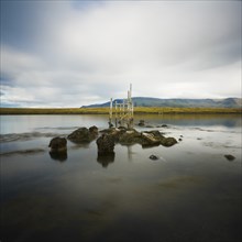 Landscape With Remnants of Old Dock in Water, Iceland