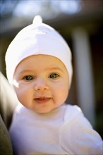 Happy Baby in White Hat