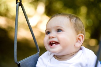 Smiling Baby on Swing