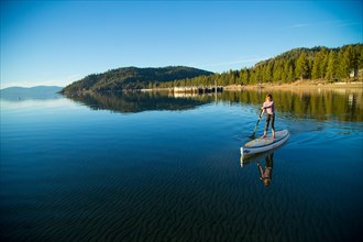 Young Girl on Paddle Board, Lake Tahoe, Nevada, USA