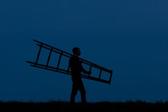 Man Carrying Ladder, Silhouette