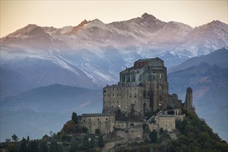 Sacra di San Michele at Sunset with Alps in Background, Italy