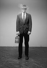 Man in Suit with Can of Gasoline II