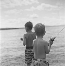 Two Young Boys Fishing