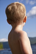 Young Blonde Boy at Lake, Rear View, Close-Up