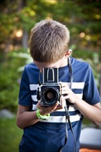 Young Boy with Camera