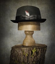 Men’s Bowler Hat on Tree Stump