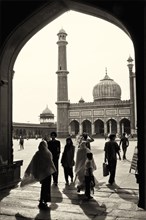 People Passing Through Archway into Mosque Courtyard, Delhi, India