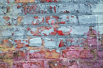 Colorful Peeling Paint on Brick Wall