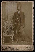 Full-length Portrait of  African American Soldier, 9th Cavalry, Company D, Sharpshooter Collar Insignia, by C.C. McBride, William A. Gladstone Collection of African American Photographs, 1880's