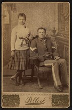 Full-length Portrait of African American Soldier in Uniform, Sitting next to Girl, by Albert Pollock, William A. Gladstone Collection of African American Photographs, between 1877 and 1890