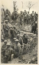 Engineers of 302nd Engineer Regiment Repairing Roadway over Trench, African American Soldiers of  92nd Infantry Division in Trench Preparing for Action, Argonne Forest, France, 1918