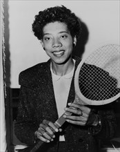 Althea Gibson, African American Tennis Player, Half-length Portrait holding Tennis Racquet, by Fred Palumbo, New York World-Telegram and the Sun Newspaper Photograph Collection, 1956