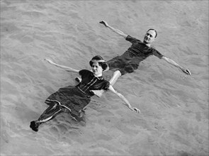 Man and Woman Floating on their Backs in Water, Detroit Publishing Company, early 1900's