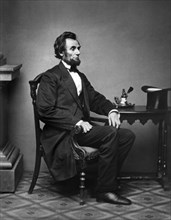Full-Length Seated Portrait of U.S. President Abraham Lincoln, Photograph by Alexander Gardner, Washington DC, USA, 1861