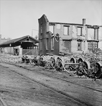 Wheels and burned railroad cars near Richmond & Petersburg Railroad station, American Civil War, Richmond, Virginia, USA, 1865