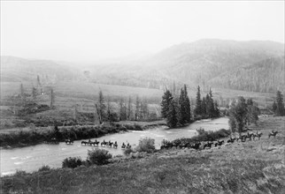 U.S. President Chester A. Arthur and Party Crossing Gros Ventre River, Yellowstone National Park, Wyoming, USA, Photograph by Frank J. Haynes, 1883