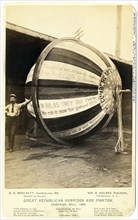 "Great Republican Harrison and Morton campaign ball, 1888", Man, possibly D. E. Brockett, Leaning against Gigantic Campaign Ball that was rolled for Benjamin Harrison during the Presidential Election ...
